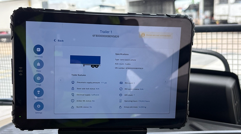 tablet interface displaying load monitoring and trailer diagnostics data tablet interface displaying load monitoring and trailer diagnostics data