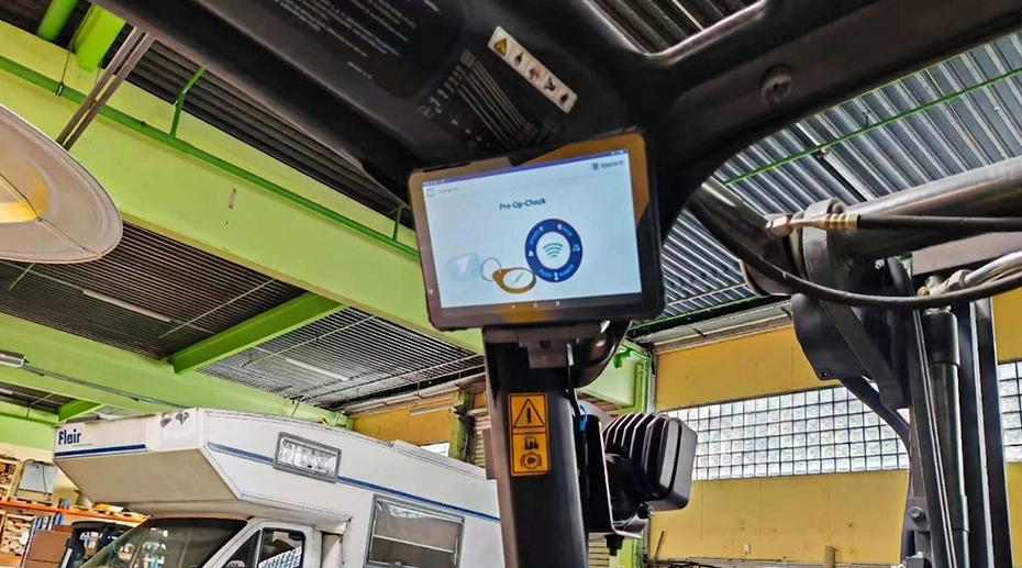 Rugged forklift tablet displaying WMS pick list in warehouseMDT865 rugged tablet mounted on forklift dashboard with RAM mount for warehouse picking and WMS terminal access