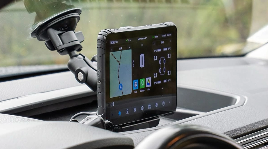 Taxi dispatch tablet mounted on dashboard showing real-time order assignment and navigation for fleet scheduling