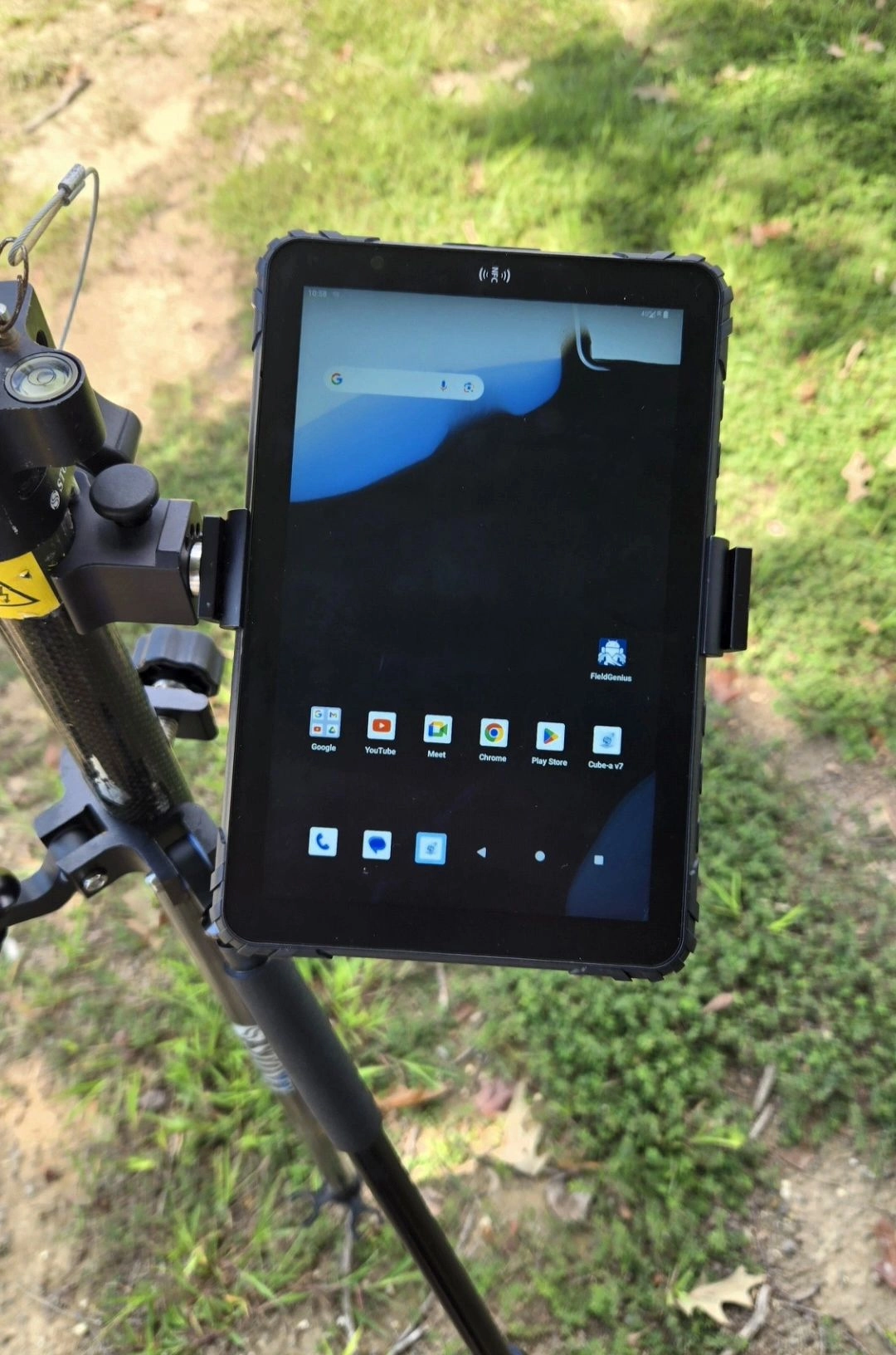 QA/QC engineer carrying an MDT865 8-inch rugged tablet during a jobsite punch list inspection.